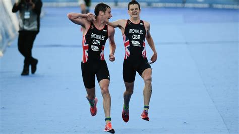 Brother Helped To The Finish Before Collapsing In Dramatic Triathlon