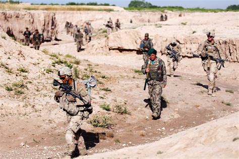 Us Paratroopers And Afghan Soldiers Move Up A Wadi During A Partnered