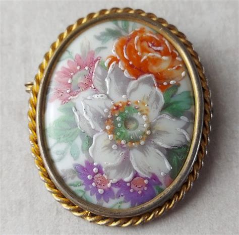 Ancienne broche fleurs en porcelaine et laiton Limoges Doré Laiton