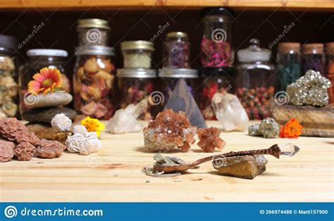 Meditation Altar With Rock Crystals And Flowers Jars Of Herbs In