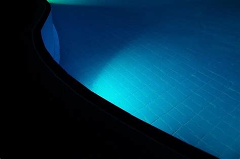 Premium Photo | View on swimming pool at night closeup