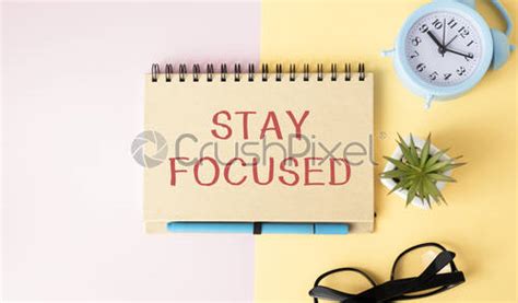 Stay Focused Handwritten On A Memo Stick And Colored Pencils Stock