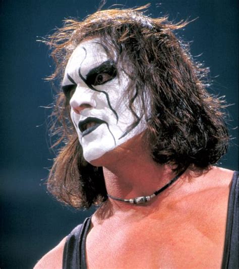 An Image Of A Wrestler With His Face Painted White And The Words Wow