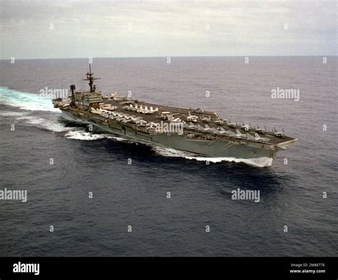 A starboard bow view of the aircraft carrier USS JOHN F. KENNEDY (CV-67 ...