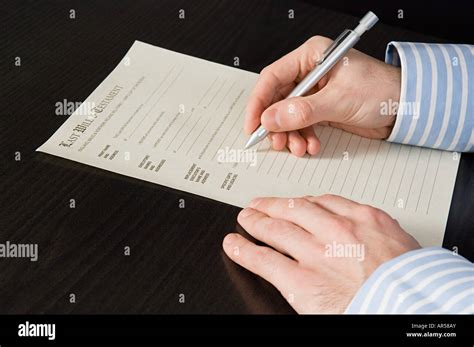 Person signing will Stock Photo - Alamy