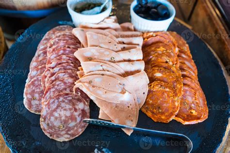 Delicious Assorted Cold Cuts Platter with Salami, Mortadella, and