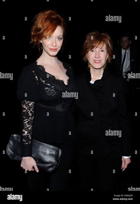 Actress Christina Hendricks And Her Mother Attend The Badgley Mischka Fall 2010 Collection At