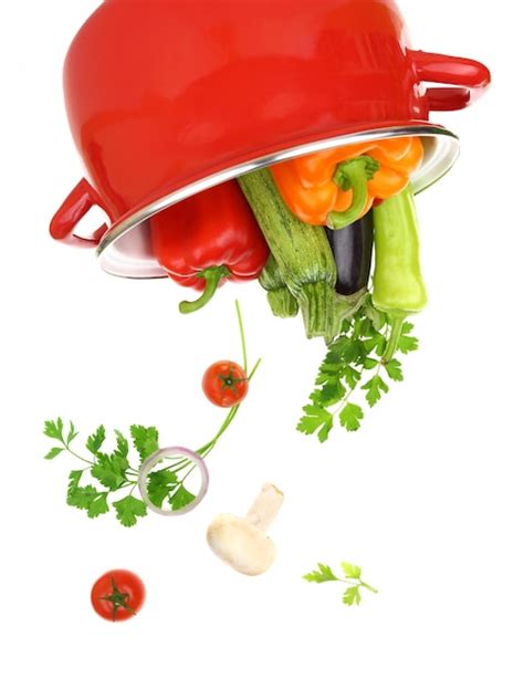 Premium Photo Colorful Vegetables In A Red Cooking Pot Isolated On