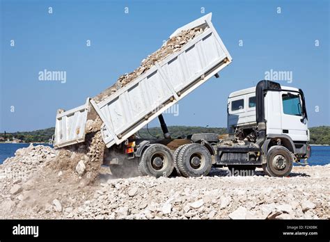 Tipper Truck Unload Crushed Rocks Stock Photo Alamy