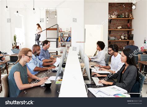 Business Colleagues Working Busy Open Plan Stock Photo 656511280