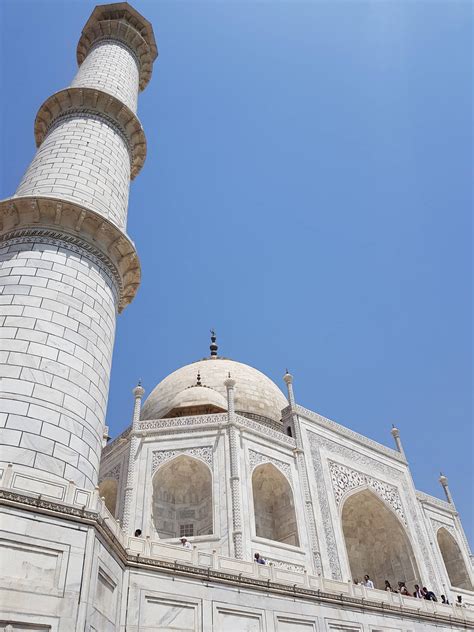 Download The Taj Mahal's Tall Minaret Wallpaper | Wallpapers.com