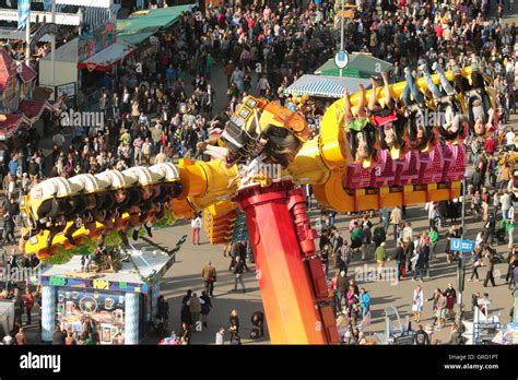 Visitors Of Munich Oktoberfest Are Having Fun Stock Photo Alamy