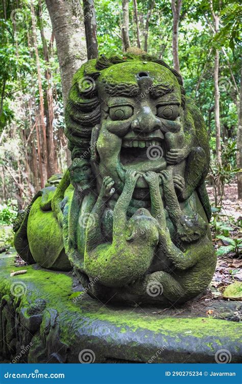 Stutue In Sacred Monkey Forest In Ubud Bali Indonesia Stock Photo