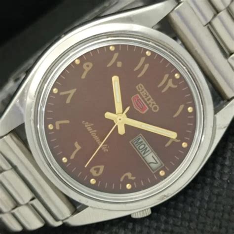 VINTAGE SEIKO 5 AUTOMATIC 7009A JAPAN MENS D D ARABIC BROWN WATCH 595a