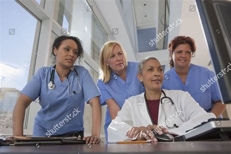 Model Released Doctor Nurses Consulting On Editorial Stock Photo