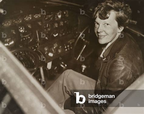 Amelia Earhart Sitting In The Cockpit Of Her Lockheed Electra Airplane C 1936 In July 1937