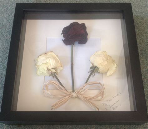 Dried Roses Super Glued Into A Box Frame With A Bow Made From The Tie