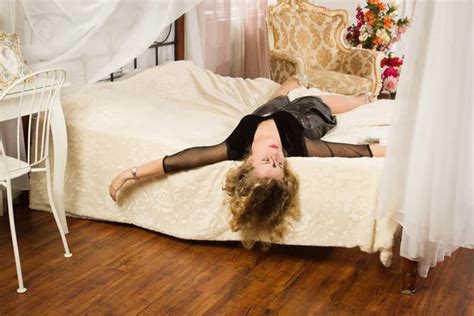 Lifeless Woman Lying On A Bed Stock Photo Demian 88082404