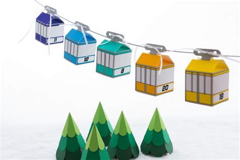 Colorful Ski Lifts Are Hanging From A Line In The Snow