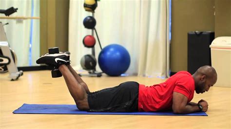 How To Lying Leg Curl With A Dumbbell At Home Lying Leg Curls Leg Curl Hamstring Curls