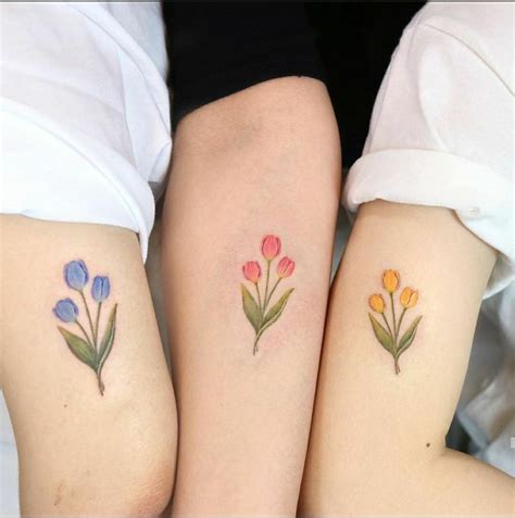 Pin By Stephanie Besse On Tattoos Tulip Tattoo Flower Wrist Tattoos