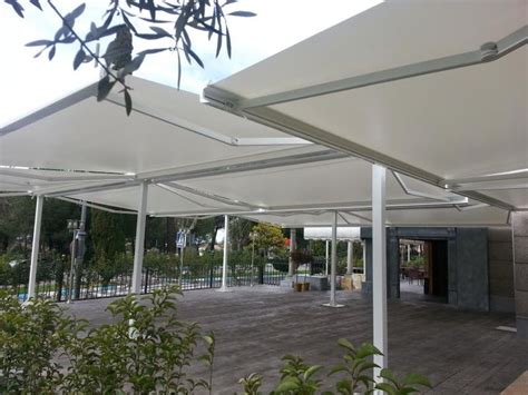 Toldos Extensibles Con Porter A En Terraza Para Restaurante Ubicado En