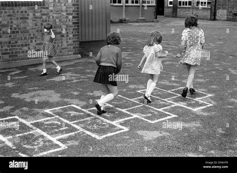 Primary School Playground Hopscotch Hop Scotch Girls Playing Stock