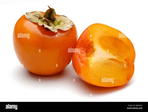 sliced ripe persimmon fruits isolated  white background