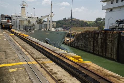 A Cargo Ship Crossing Panama Canal At Miraflores Lock In Panama City