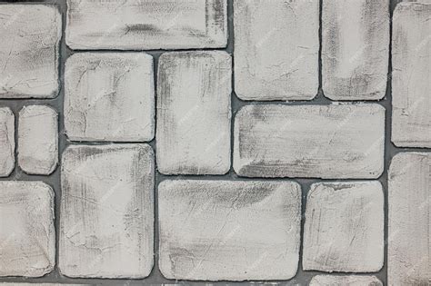 Premium Photo | Grey brick wall large brick on the wall