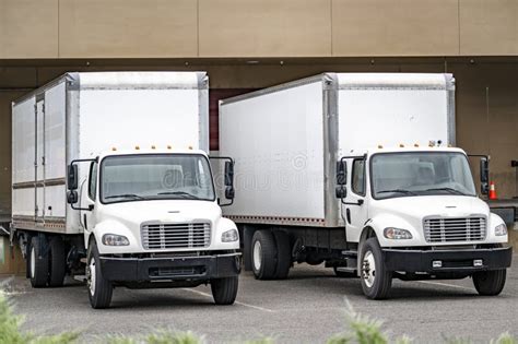 Day Cab Middle Rig Semi Truck With Long Box Trailer Making Local Delivery Unloading Goods