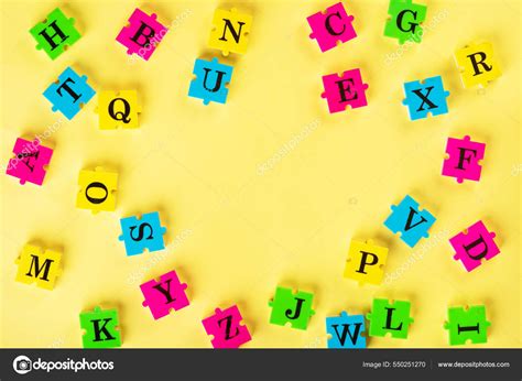 Top View Of English Alphabet From Multi Colored Puzzles With Copy Space