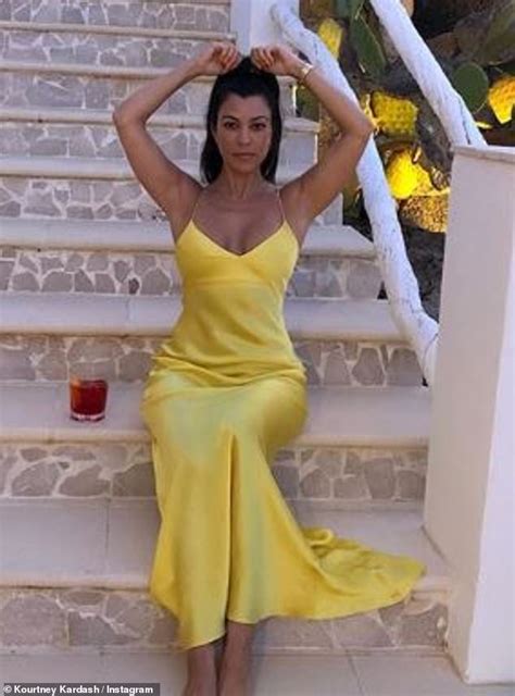 Kourtney Kardashian 40 Displays Physique In Yellow Two Piece As She Continues Italian Getaway