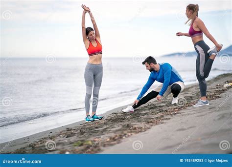 Group Of Friends Stretching Together Active Lifestyle Stock Image