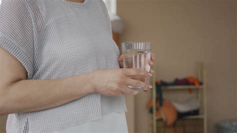 Woman Drinking Water from a Drinking Glass · Free Stock Video