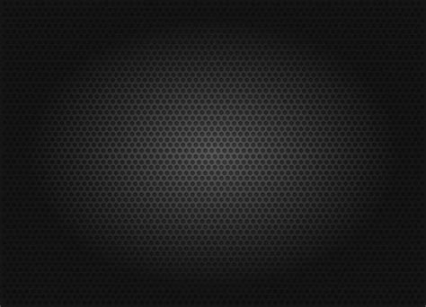 Premium Vector | Structure black perforated metallic background