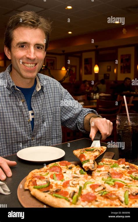 Pizza slice at Pizza Hut Stock Photo - Alamy