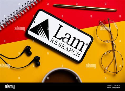 In this photo illustration, a Lam Research logo seen displayed on a ...