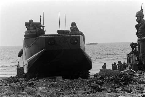 An LVTP 7 Tracked Landing Vehicle Comes Ashore As U S Marines