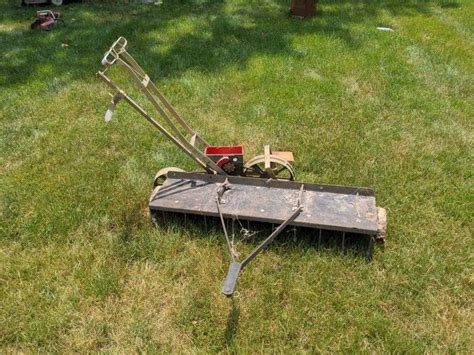 Pull Behind Lawn Rake And Seeder Lot Aumann Auctions Inc