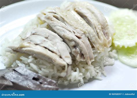 O Arroz Da Galinha De Hainanese Ou O Arroz Cobriram Galinha Imagem