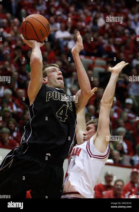 Purdue Forward Robbie Hummel Left Puts Up A Shot Against Indiana