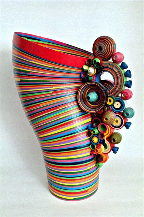 A Vibrant Rolled Paper Sculpture Vase By Coleccion Serpentina Is