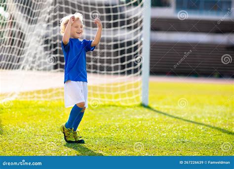 Kids Play Football Child At Soccer Field Stock Image Image Of Green