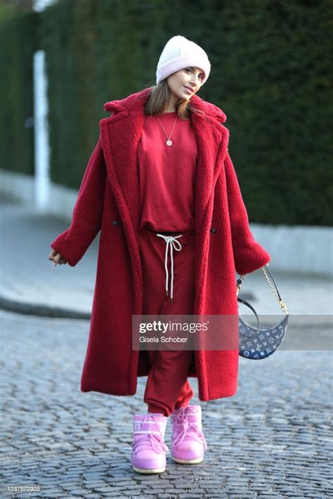 Cathy Hummels Wearing A Red Teddy Coat By Max Mara Red Jogging Suit