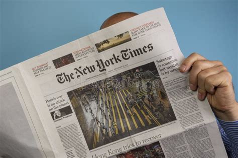 Reading The New York Times Newspaper Editorial Stock Image Image Of Break Person 259361084