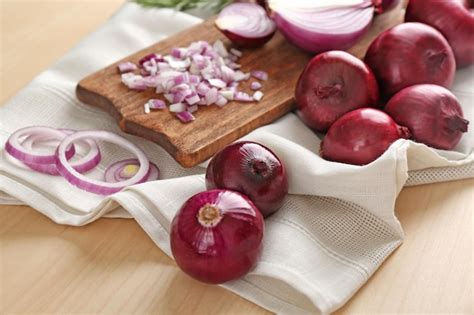 Premium Photo Ripe Red Onions On Table