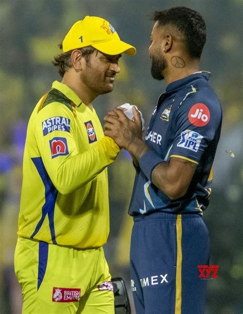 Chennai Chennai Super Kings Captain Ms Dhoni Shakes Hands With Gujarat Titans Captain