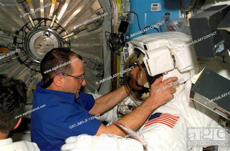 Astronaut Donald R Pettit Nasa Iss Science Officer Assists Astronaut