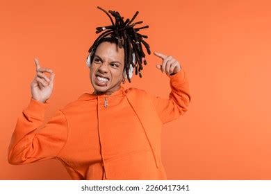 Portrait Pierced Multiracial Man Dreadlocks Pouting Stock Photo